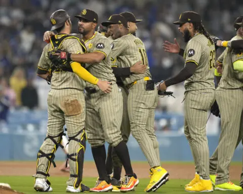 Padres turn triple play to clinch playoff spot with 4-2 win over Dodgers