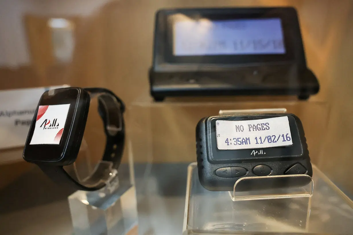 FILE PHOTO: Pagers on display at a meeting room in the Gold Apollo company in New Taipei City