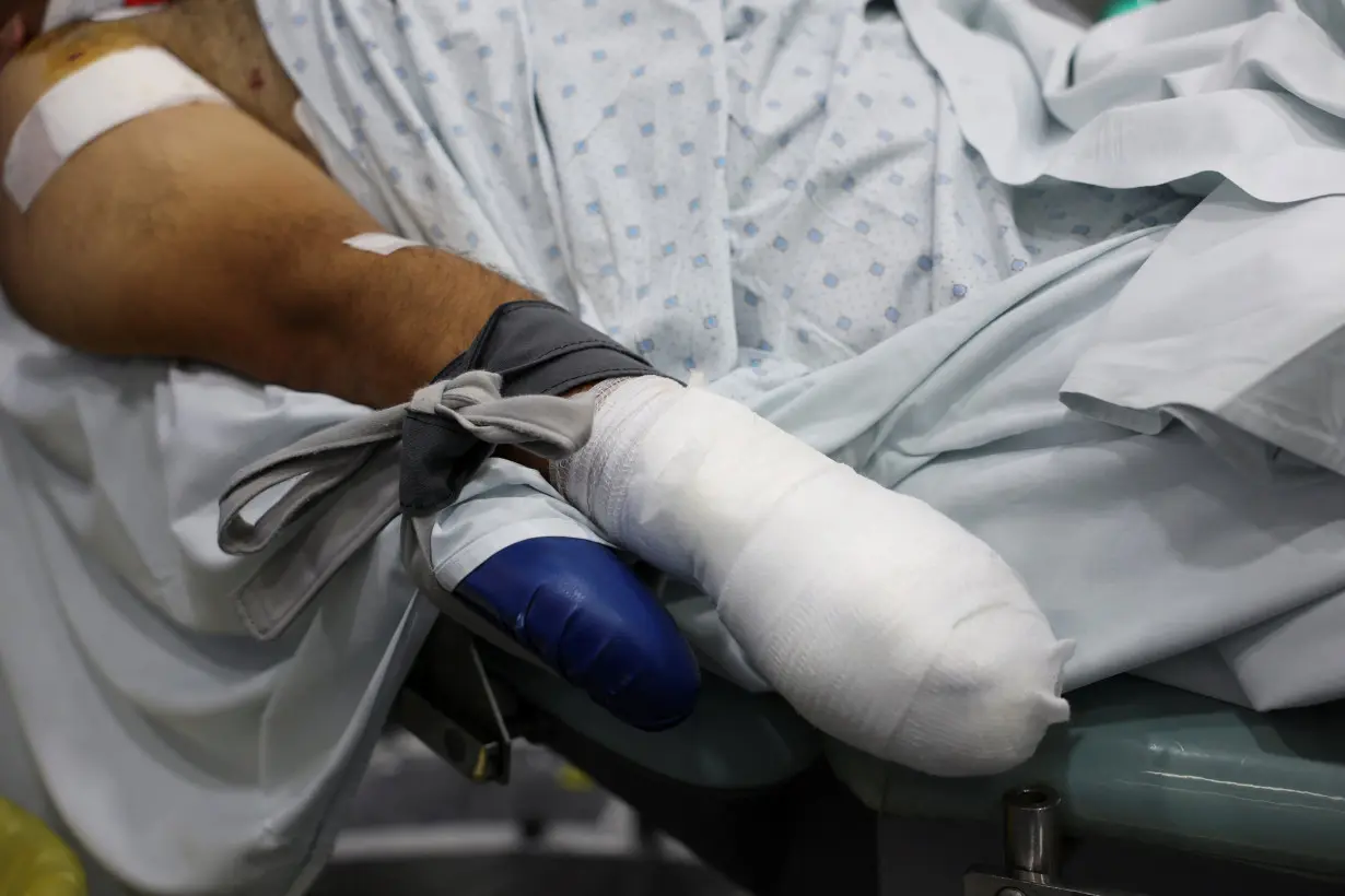 FILE PHOTO: An injured man undergoes an operation at a hospital in Beirut