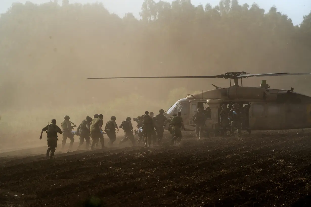 FILE PHOTO: IIsrael's military evacuate injured people by helicopter