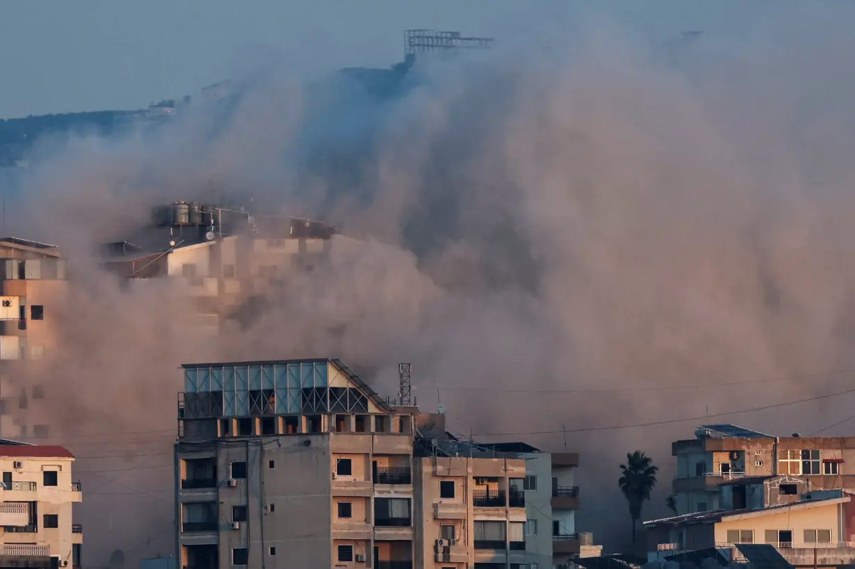 Smoke billows over southern Lebanon following an Israeli strike as seen from Tyre