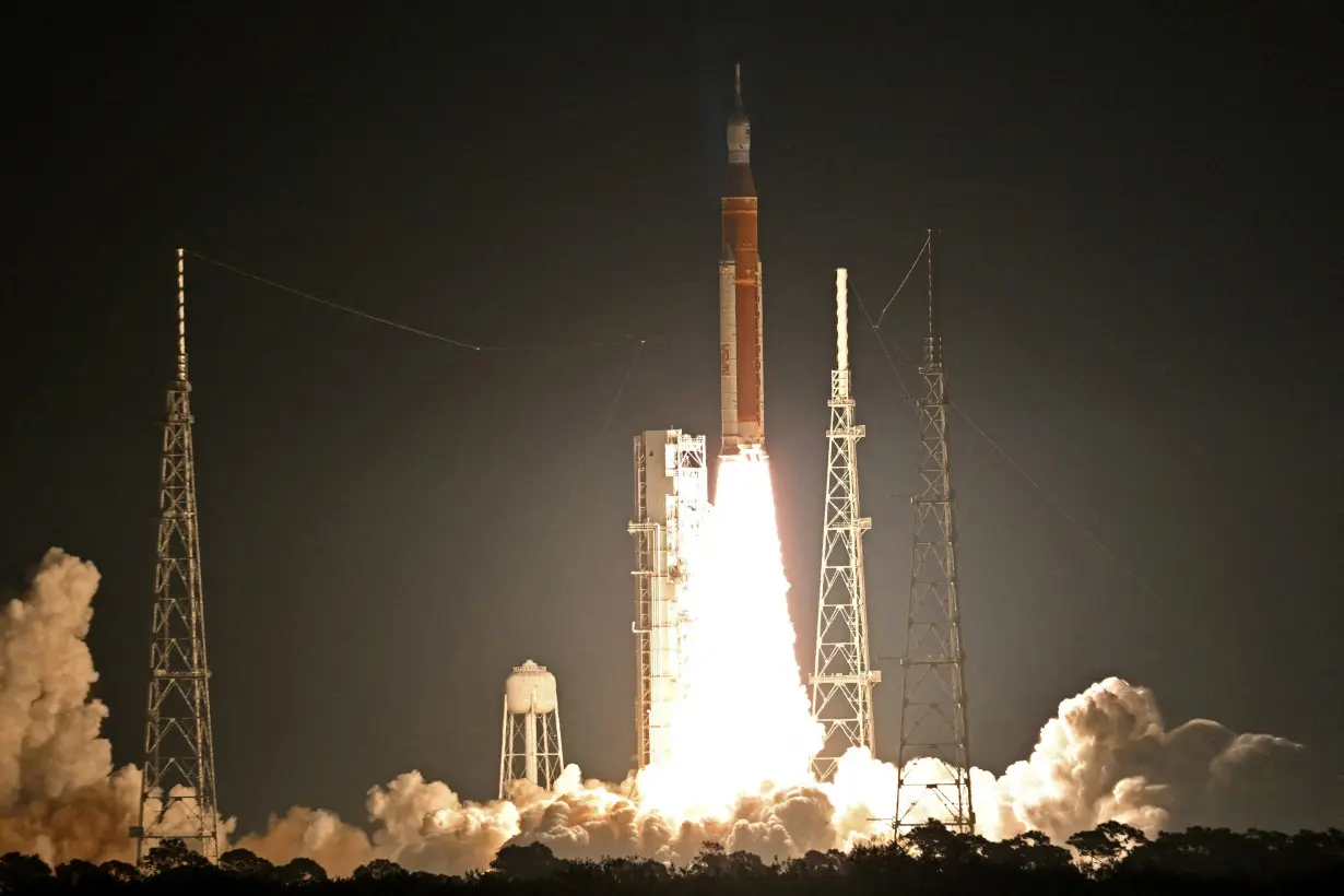 FILE PHOTO: NASA's next-generation moon rocket lifts off on the unmanned Artemis I mission to the moon at Cape Canaveral