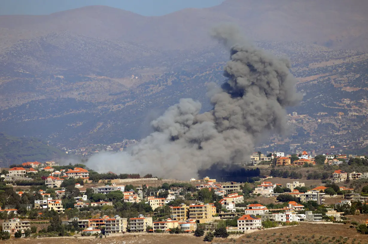 Smoke billows over Khiam