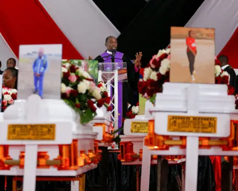 Kenyan school blaze victims mourned at mass funeral