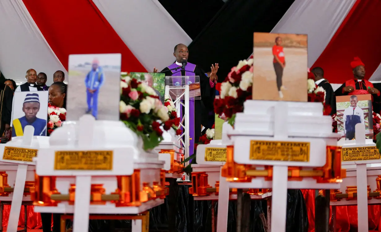 Coffins are arranged before a memorial service for the pupils who died after a fatal fire at the Hillside Endarasha Academy within Kieni in Nyeri County