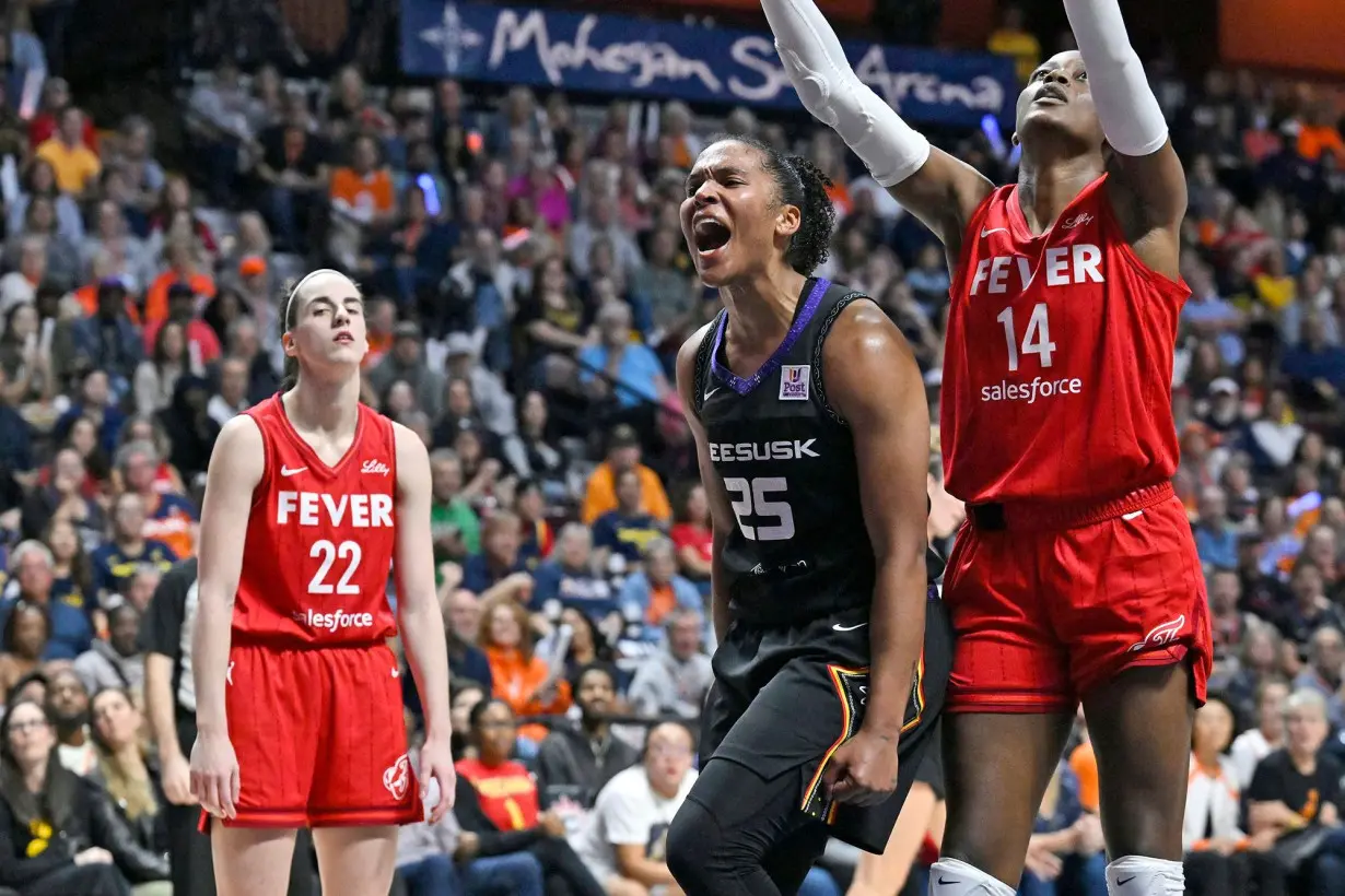 Connecticut Sun forward Alyssa Thomas celebrates during her team's series-sealing win over the Indiana Fever.