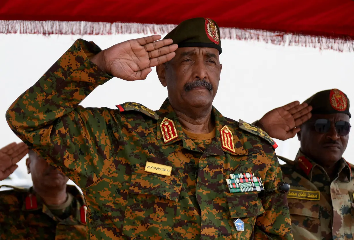 FILE PHOTO: Sudan's military ruler Burhan arrives to the city of Port Sudan on his first trip away following the crisis in Sudan capital Khartoum