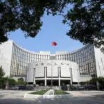 China central bank cuts seven-day reverse repo rate to aid economy