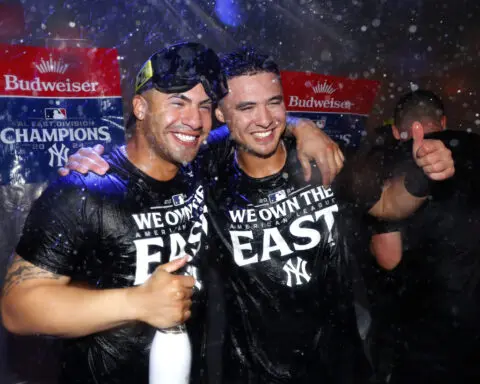 Yankees win AL East title with 10-1 victory over Orioles behind Judge, Stanton and Cole