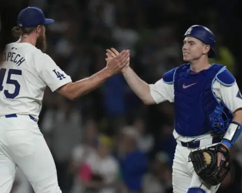 Shohei Ohtani heads to 1st postseason after Dodgers clinch NL West title with a 7-2 win over Padres