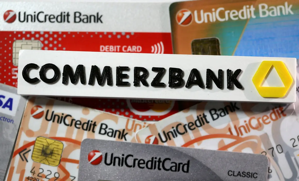 FILE PHOTO: A 3-D printed Commerzbank logo are seen near Unicredit credit cards in this illustration taken