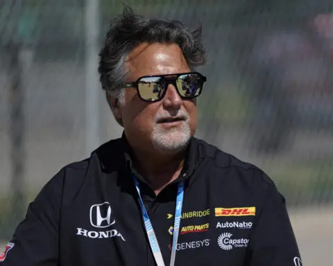 Michael Andretti hands over control of race team to business partner. Formula 1 plans in limbo