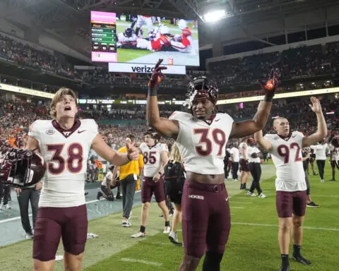 No. 7 Miami survives Virginia Tech 38-34 to remain unbeaten after Hail Mary TD overturned