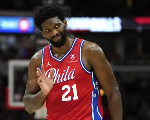 76ers star Joel Embiid honors his late brother at a Philly block party