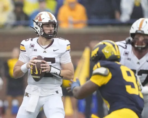 No. 12 Michigan holds off Minnesota in 4th quarter to win 27-24 and retain Little Brown Jug