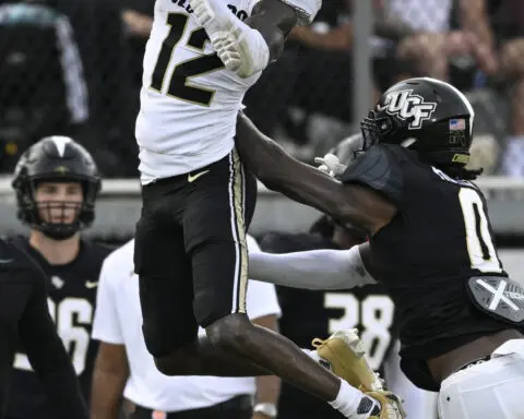 Shedeur Sanders throws for 290 yards, 3 TDs to lead improved Colorado to 48-21 rout of UCF