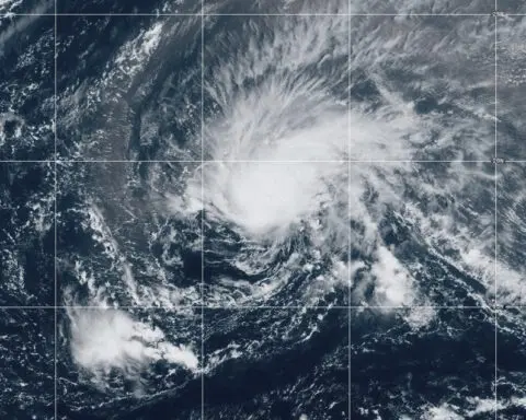 Hurricane Isaac and Tropical Storm Joyce move through the open Atlantic far from land