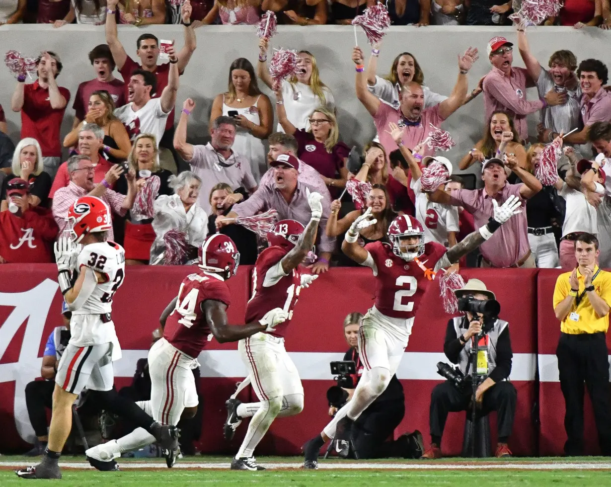 Alabama Crimson Tide celebrate their win against the Georgia Bulldogs.