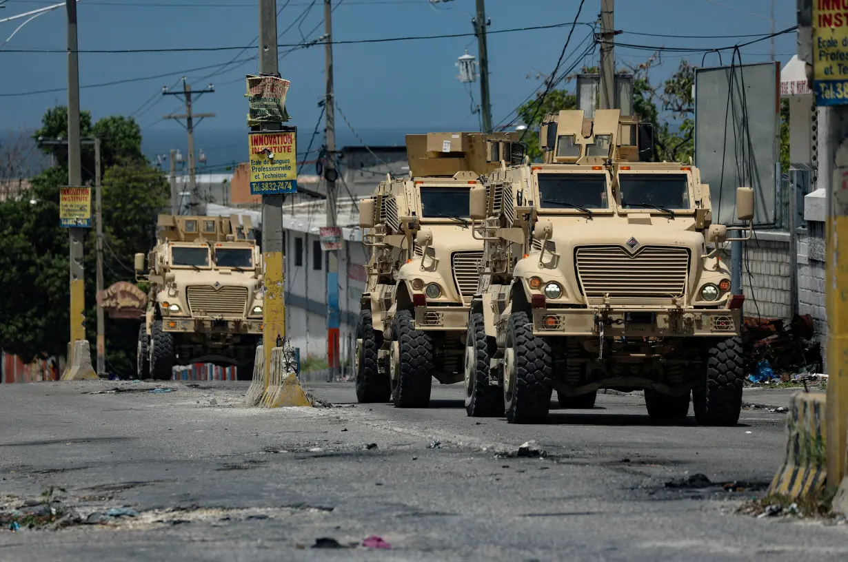 FILE PHOTO: Kenyan police forces patrol a neighbourhood in Port-au-Prince