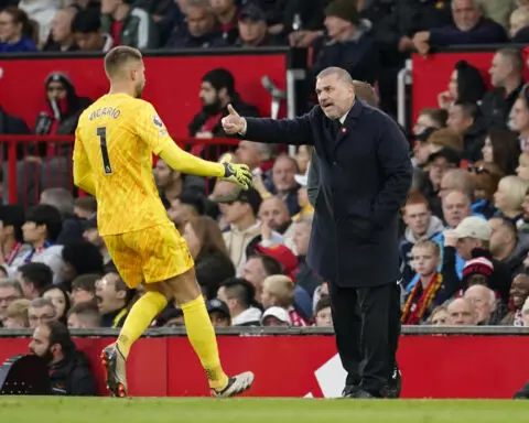 Man United fans leave early and boo the players after 3-0 humbling at home to Tottenham