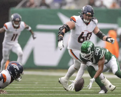 Broncos running back Tyler Badie carted from sideline with a back injury