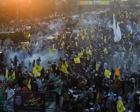 Pakistanis protesting Hezbollah leader's killing clash with Karachi police
