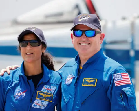 SpaceX capsule for stuck astronauts docks at space station