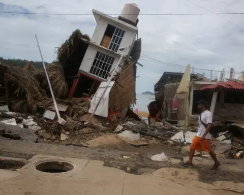 At least 22 reported dead as storm John dissipates over Mexico