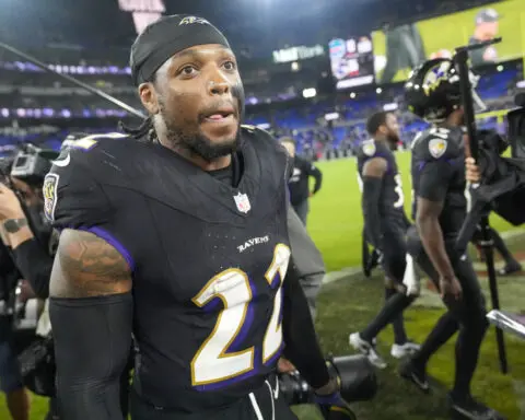 Henry runs for 199 yards and Jackson has 3 TDs as Ravens rout previously unbeaten Bills 35-10