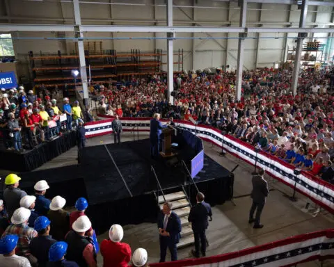 Man who claimed he had explosives at Trump rally in Michigan is charged