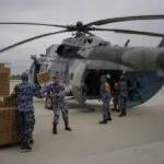 Along Mexico's Pacific coast, flooding from Hurricane John left devastated towns and 17 dead