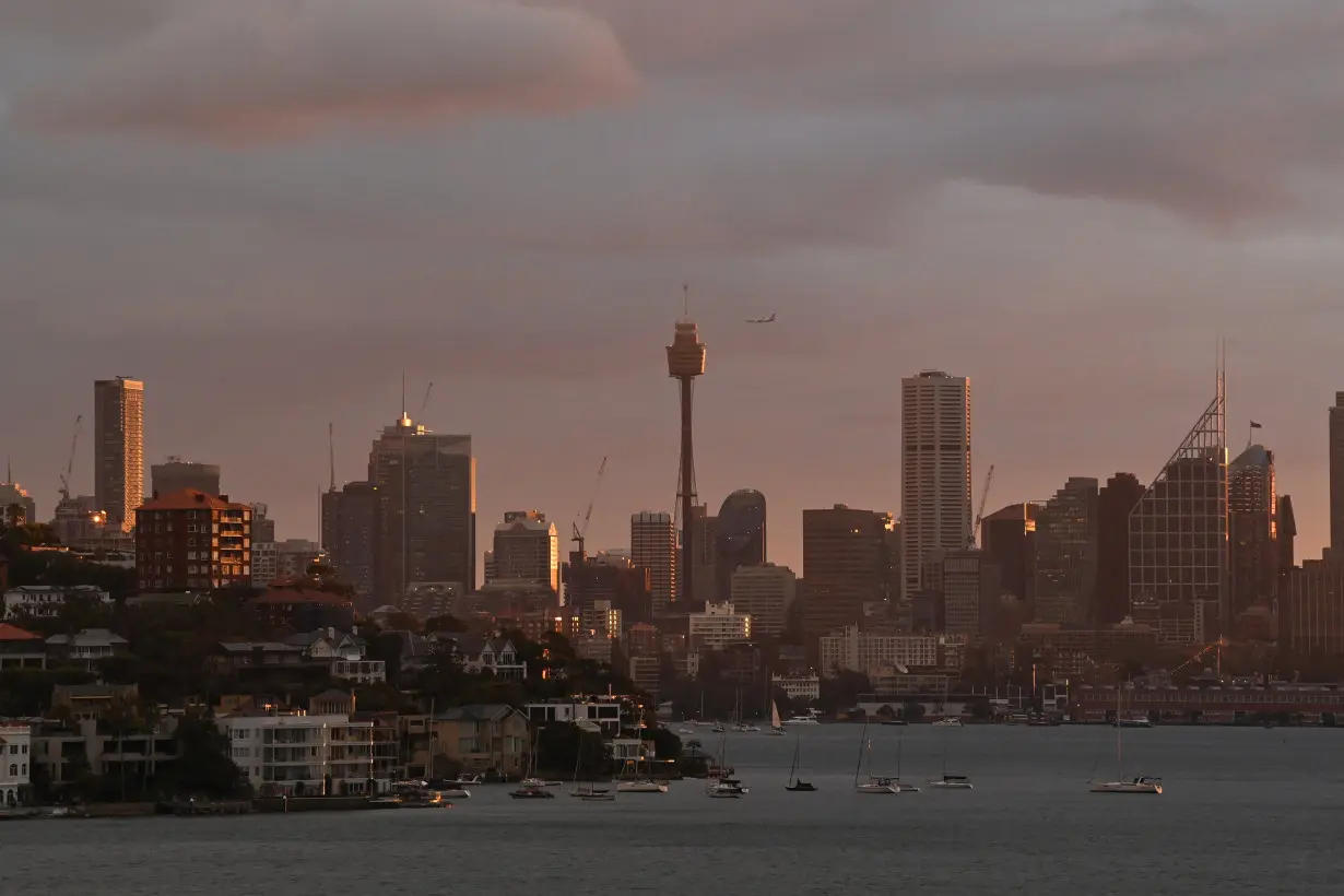 A view of the city skyline and Sydney Harbour, in Sydney