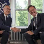 NATO's long-time chief hands over to a former Dutch premier