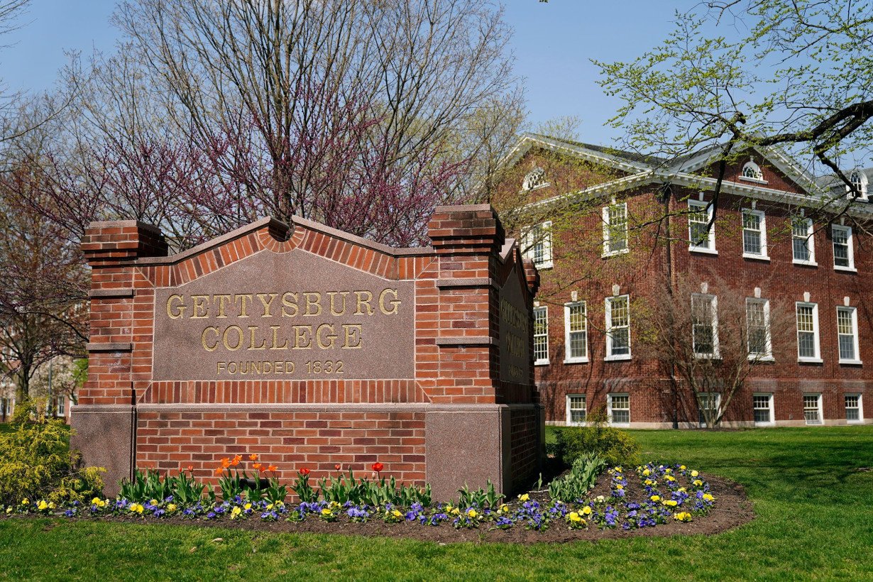 A student has left Gettysburg College after a racial slur was etched onto a student's chest, school officials say