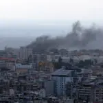 Israel carries out strikes in Beirut, southern suburbs, sources say