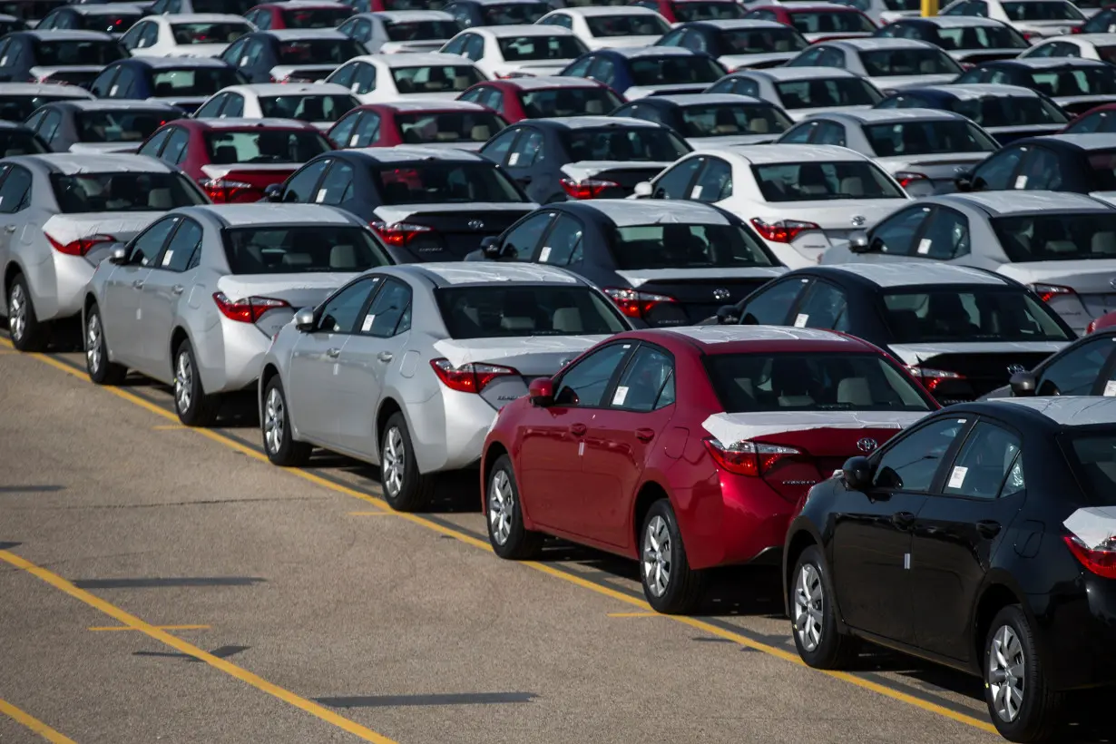 New cars are seen at the Toyota plant in Cambridge