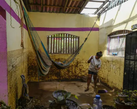 Along Mexico's Pacific coast, flooding from Hurricane John left devastated towns and 17 dead