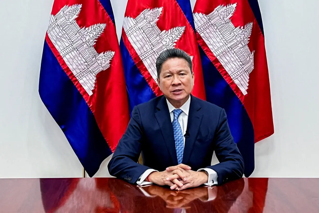 FILE PHOTO: Cambodia's Deputy Prime Minister Sun Chanthol speaks during an interview with Reuters in Phnom Penh