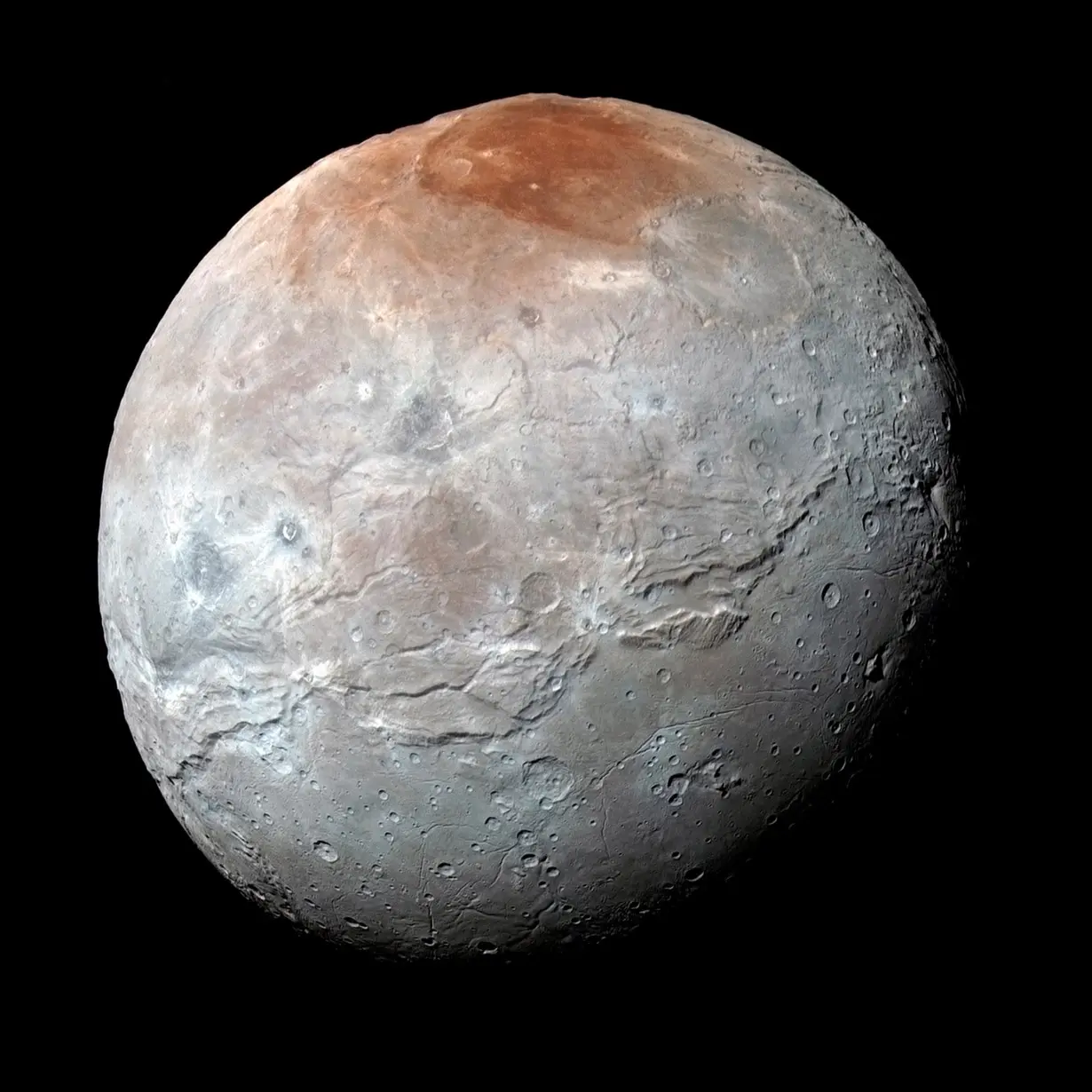 FILE PHOTO: Pluto's largest moon, Charon, is seen in a high-resolution, enhanced color view captured by NASA's New Horizons spacecraft