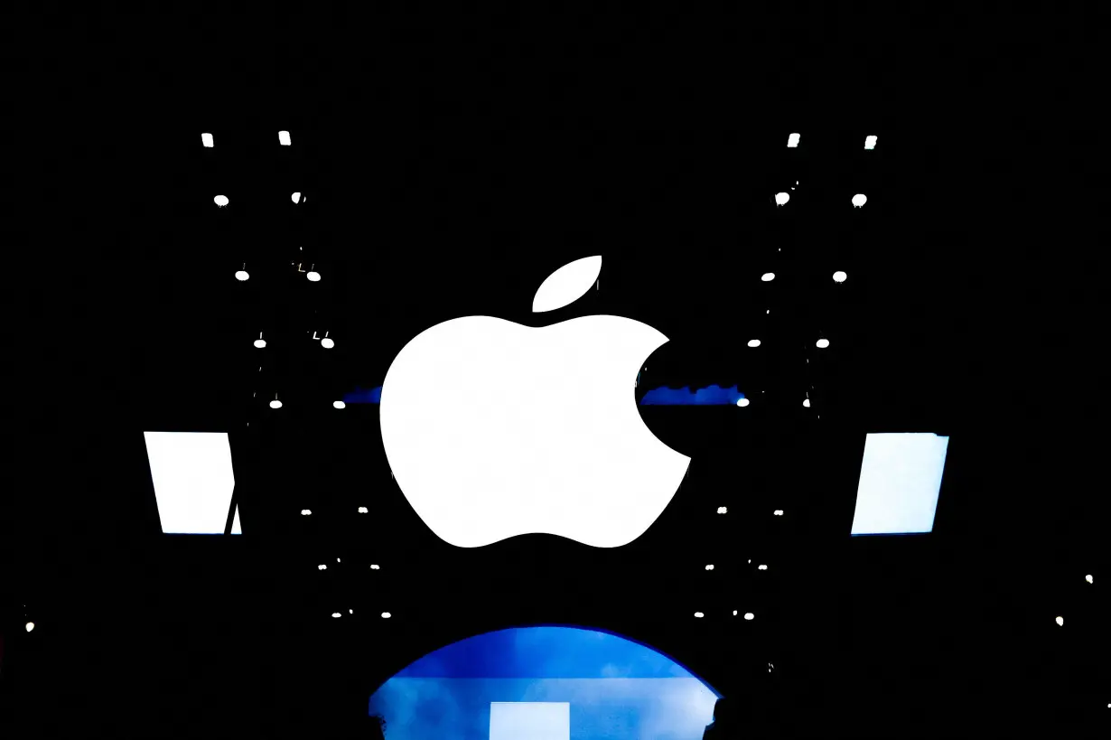 FILE PHOTO: Apple logo at an Apple store in Paris