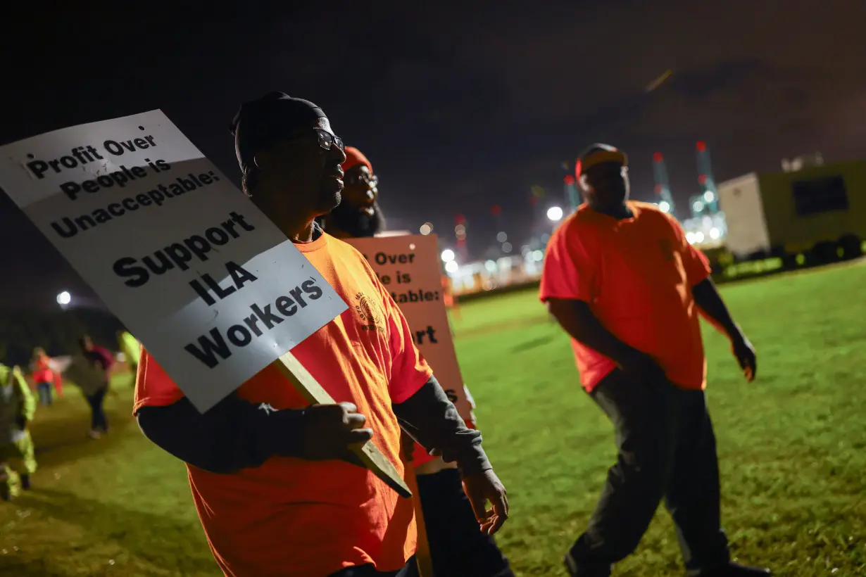 Port workers participate in a strike at the Virginia International Gateway in Portsmouth