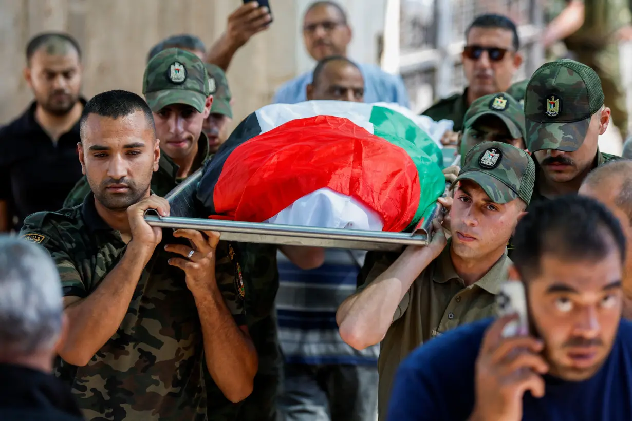 Funeral of a Palestinian killed in Jericho as Iran fired a salvo of ballistic missiles against Israel, in the occupied West Bank