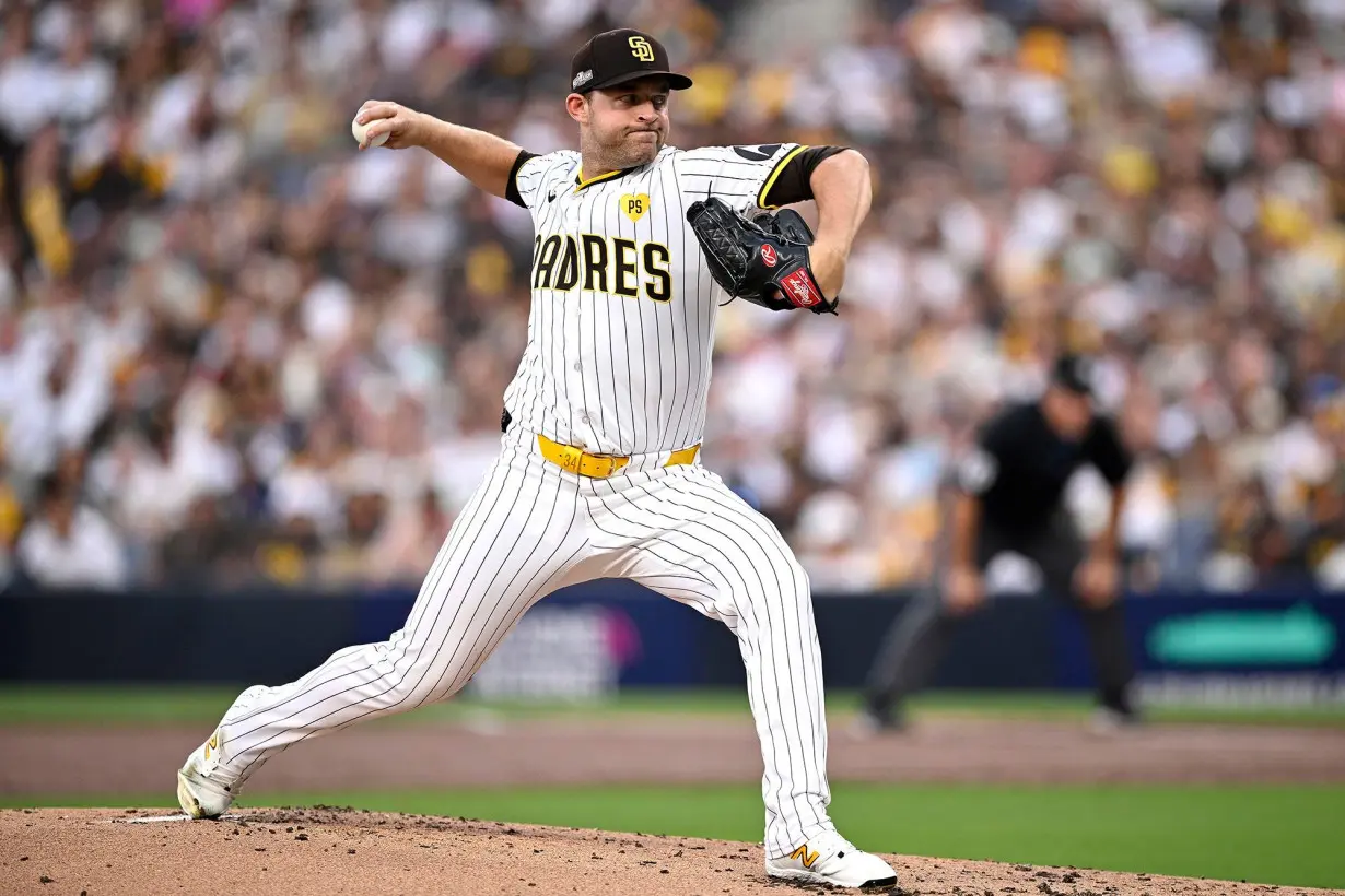 Michael King throws a pitch against the Atlanta Braves during the second inning at Petco Park.