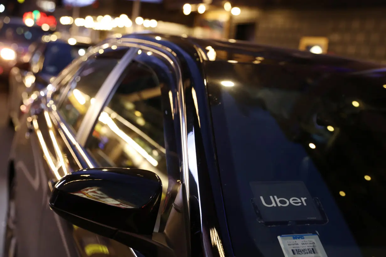 The logo for Uber Technologies is seen on a vehicle in Manhattan, New York City