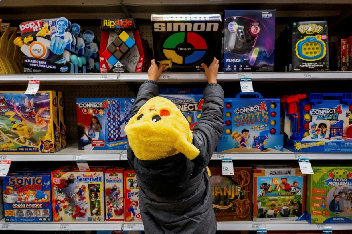 FILE PHOTO: Shoppers converge in a Target store ahead of the Thanksgiving holiday