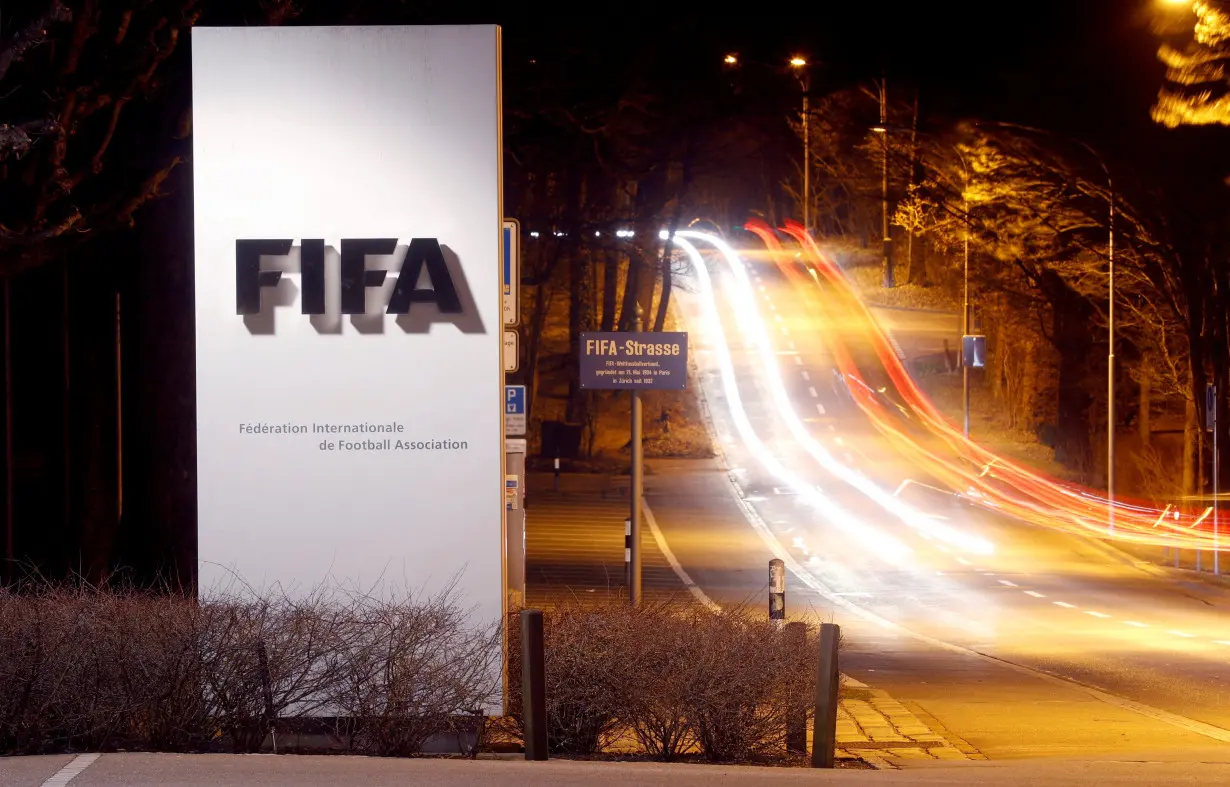 FILE PHOTO: A long exposure shows FIFA's logo near its headquarters in Zurich