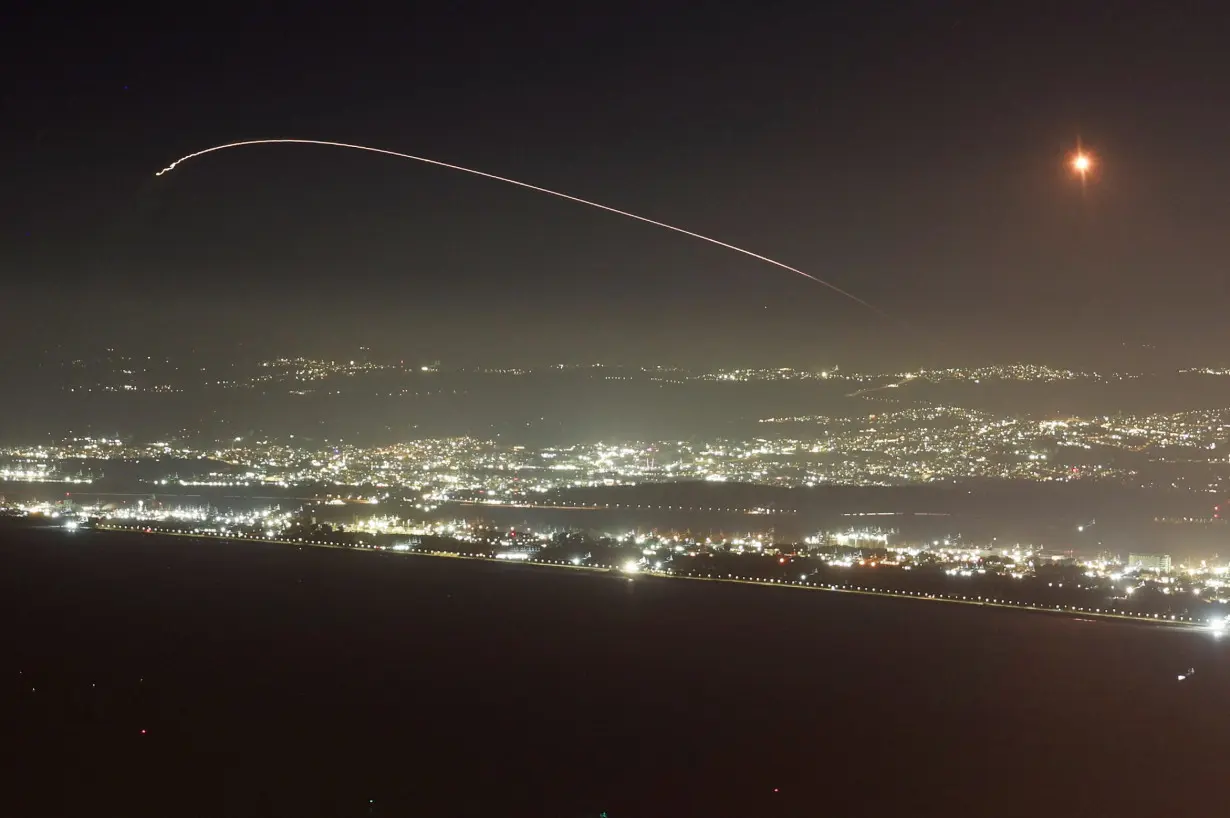 Israel's Iron Dome anti-missile system operates for interceptions as rockets are launched from Lebanon, as seen from Haifa