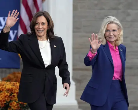 The Latest: Harris campaigns in Wisconsin and Trump in Michigan in battle for 'blue wall' states