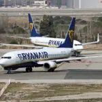 184 passengers and crew evacuated as Ryanair Boeing plane catches fire on runway in Italy