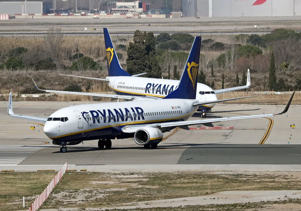 184 passengers and crew evacuated as Ryanair Boeing plane catches fire on runway in Italy